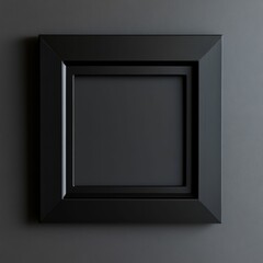Black frame, dark gray wall, empty space.