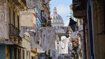 hanging clothes on the street in havana 