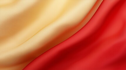 a close up of a red and gold fabric