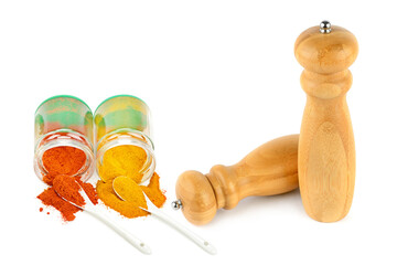 An assortment of oriental spices and seasonings spice mill isolated on a white background