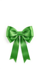 A vibrant green bow, perfectly isolated against a stark white background, close-up, craft