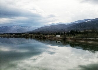 Bulgaria, cloudy weather. Mirror image of mountains.