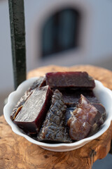 Pieces of very matured cured ham jamon serrrano iberico