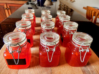 Freshly filled jars of homemade Sweet Chilli Sauce.
