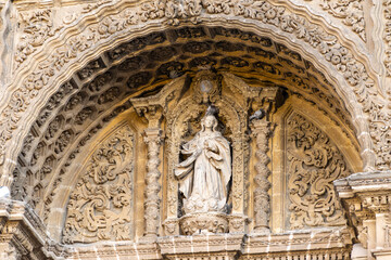Obraz premium Walking in old part of Jerez de la Frontera, Sherry wine making town, Andalusia, Spain in summer, architectural details, Andalusian style, churches and towers