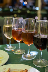 Tasting of sherry wines from barrels, fino, manzanilla, olorosso, amontillado jerez wines with traditional Andalusian tapas in old tavern, Sanlucar de Barrameda, Cadiz, Andalusia, Spain