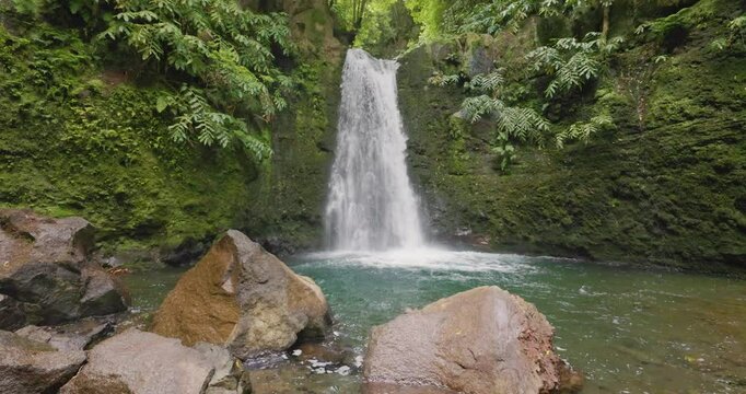 The waterfall 'Cascata do Salto do Prego' in a dense subtropical forest in slow motion
