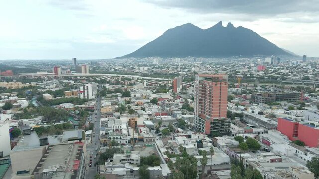 Aerial drone view of Cerro de la Silla and Monterrey cityscape, Mexico 3
