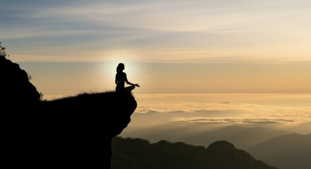 Fototapeta premium Woman meditating at cliff edge during sunset
