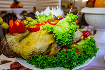 Festive duck dish adorned with fresh vegetables
