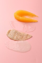 Samples of cosmetic products on pink background. Skin care