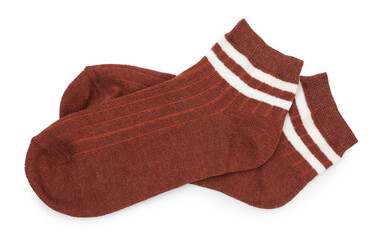 Pair of soft socks isolated on white, top view