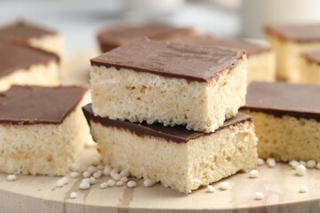 Delicious puffed rice bars on table, closeup