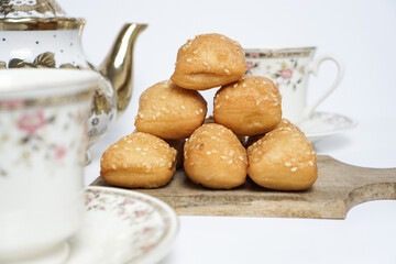 Odading, a box-shaped fried bread that expands like a pillow, with a like brown crispy outer shell...