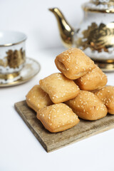 Odading, a box-shaped fried bread that expands like a pillow, with a like brown crispy outer shell...