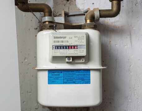 Paris, France- Nov 22, 2021: Close-up of a Schlumberger gas meter displaying the numbers 666 device in its reading, mounted on a concrete wall
