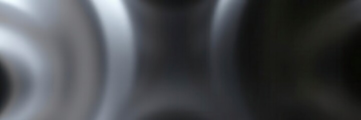 Reflective black polished aluminum surface with a sleek and modern look, polished, shiny, aluminum