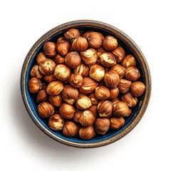 Obraz premium Bowl of hazelnuts overhead shot.