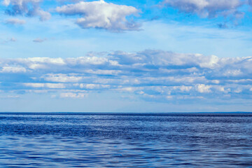 Sky-water landscape of Lake Onega in Karelia on a summer day.