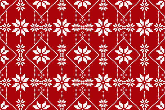 Christmas and New Year seamless pattern. White snowflakes on red pixel pattern for winter hat,jumper,sweater, wrapping,fabric,border,rim,carpets, blankets, towels.