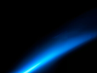 A glowing blue light beam on a dark background, radiating energy and sleek design. Perfect for technology and futuristic visuals. Generative AI