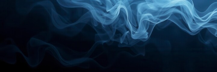 Fototapeta premium Abstract smoke billowing on a dark black background, abstract, elegant, movement