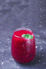 dragon fruit juice on a wooden background
