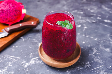 dragon fruit juice on a wooden background