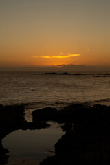 Beautiful and romantic orange sunset over the sea. Preserved environment.