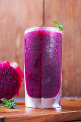 dragon fruit juice on a wooden background