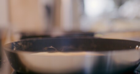 Baking Pancake in Pan in Kitchen