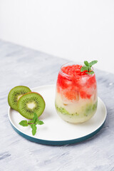 a glass of fresh drink made from kiwi, Yakult and watermelon, Ramadan drink