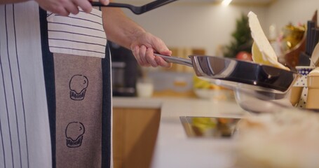 Flipping Pancake in Pan Close-Up