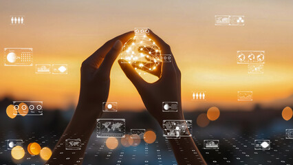 Futuristic hands holding a radiant digital sphere