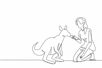 Single one line drawing woman in casual clothes squatting and feeding carrots to a kangaroo. Giving with patience and care. Loving. National Zoo Lovers Day. Continuous line design graphic illustration