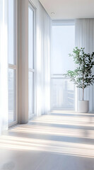 A bright, airy room with large windows and a decorative indoor plant.