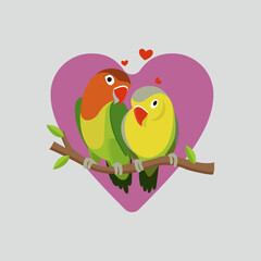 a pair of lovebirds perched o...