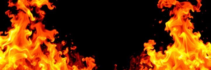 Fototapeta premium Abstract fire flames with vibrant colors on a dark black background, vibrant, bright, black background