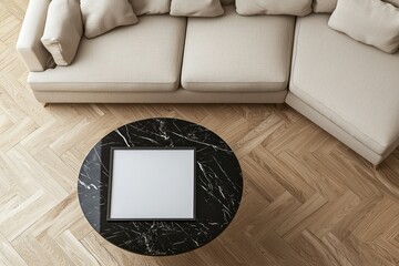 Elevated perspective of living room with black marble table, beige sofa, and natural lighting.