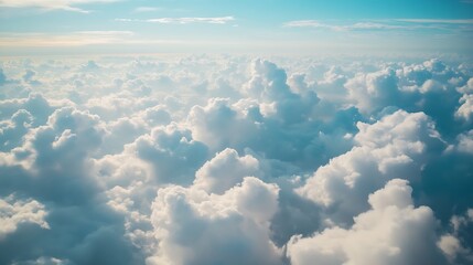 Fluffy Cloudscape from Above. Concept of vastness, freedom, and serenity.