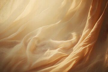 Fototapeta premium Soft flowing fabric texture in warm golden light, featuring delicate folds and a smooth aesthetic, perfect for minimalistic, artistic, or luxurious design inspirations