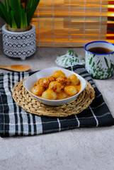 Cilok is an Indonesian ball-shaped dumpling made from aci (tapioca starch), a Sundanese snack originated from Indonesia.