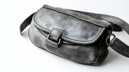 Gray leather crossbody bag on white.