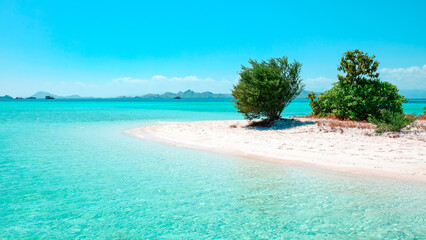 Beautiful beaches island, crystal clear sea and blue sky with a cloudy. summer background and summer vacation concept.
