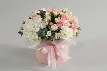 Bouquet of beautiful flowers on grey background