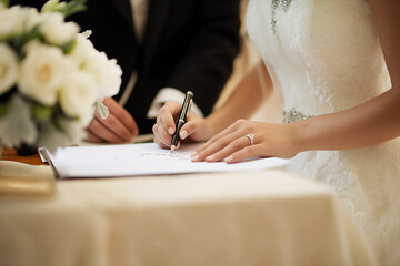 Bride Signing Document