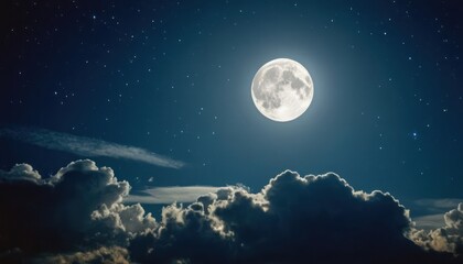 Fototapeta premium Full moon illuminating clouds and stars in bluish night sky