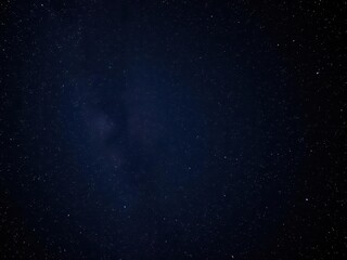 Fototapeta premium A mesmerizing view of a distant star cluster with tightly packed glowing stars, endless, celestial, space