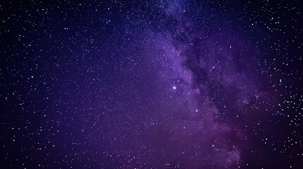 Obraz premium The starry purple night sky stretches endlessly, with constellations shimmering like tiny jewels scattered across velvet.
