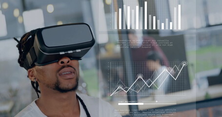 Image of data processing over african american businessman using vr headset